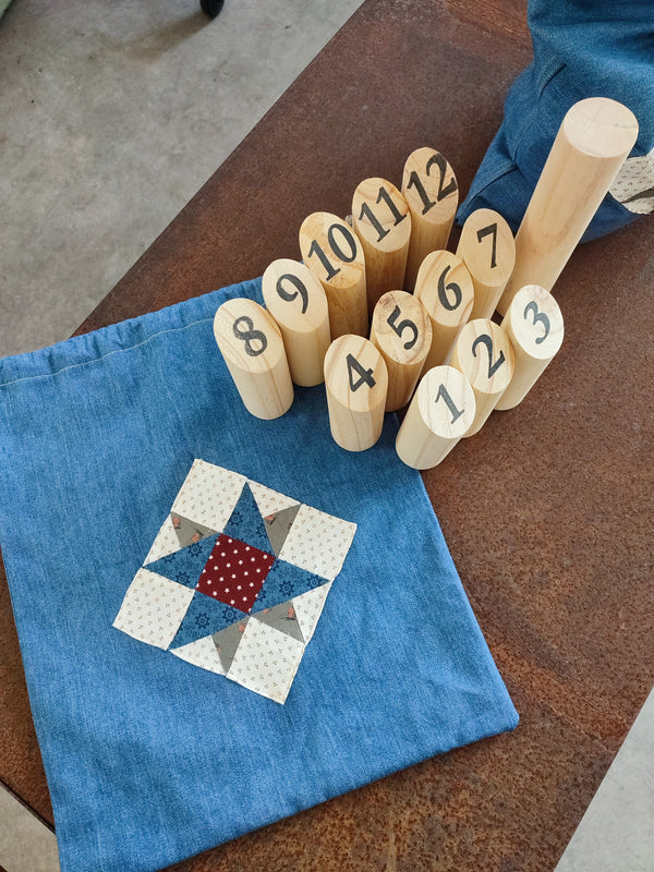 Jeu de quilles nordiques avec son sac de rangement en patchwork- DB Decoration